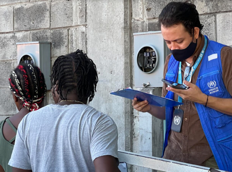 UN workers help long lines of immigrants apply for aid in Tapachula Mexico