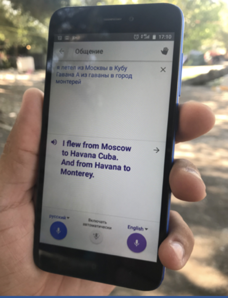 A Russian immigrant in Mexico, speaks to the author using a translation app in 2018